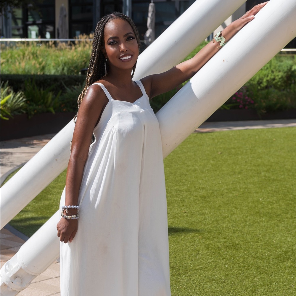 All white jumpsuit from Fashion Nova